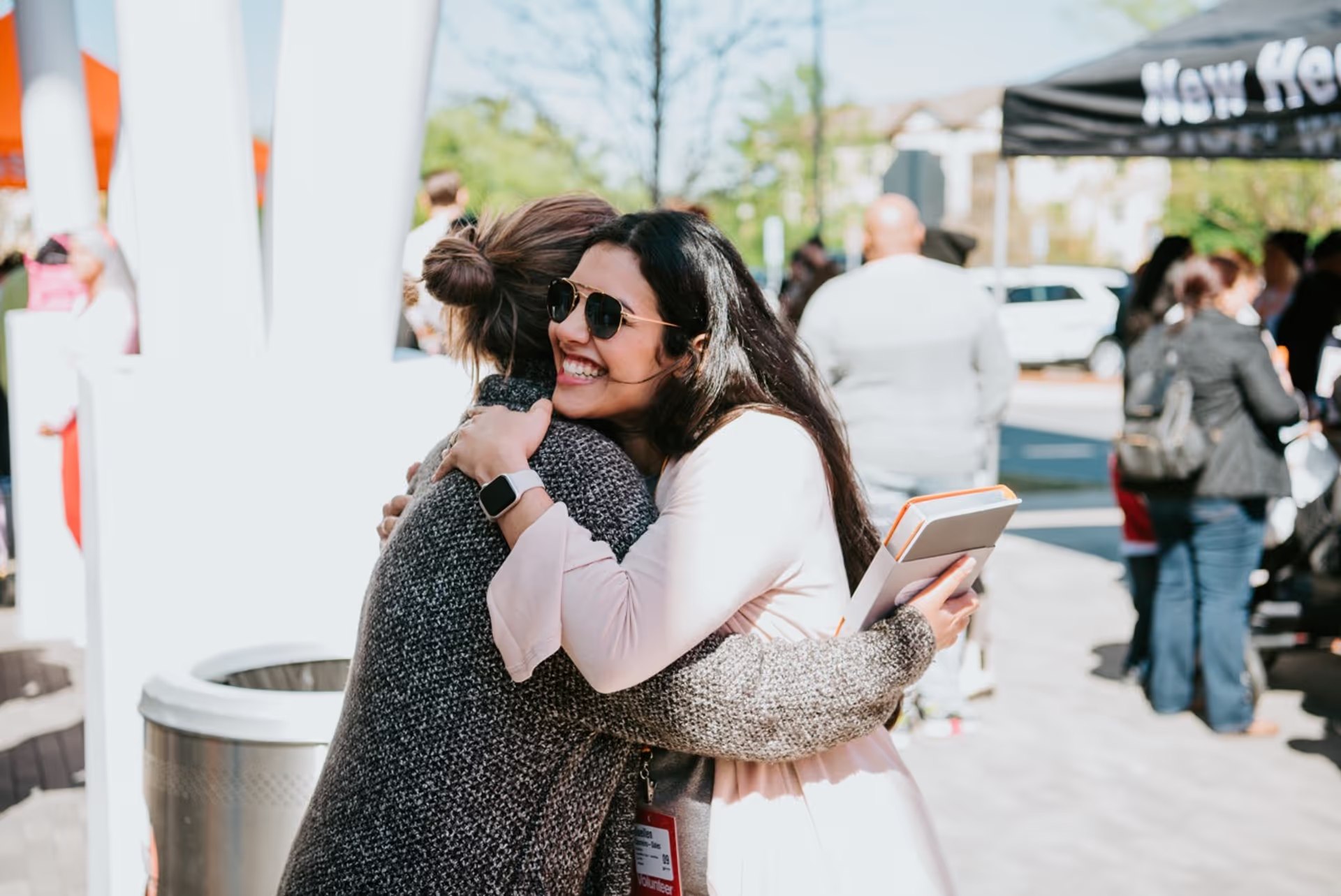 Two people embracing at a church community event